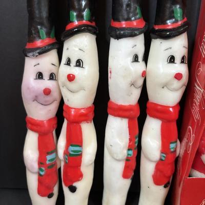 LOT 290: Holiday Candle Collection & More: Santa & Snowman Tapered Candles,Gift Bag Music Boxes, Gold Bead Garland, Peppermint...