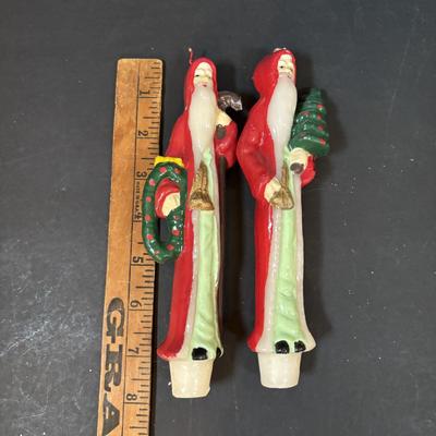 LOT 290: Holiday Candle Collection & More: Santa & Snowman Tapered Candles,Gift Bag Music Boxes, Gold Bead Garland, Peppermint...