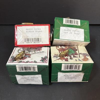 LOT 290: Holiday Candle Collection & More: Santa & Snowman Tapered Candles,Gift Bag Music Boxes, Gold Bead Garland, Peppermint...