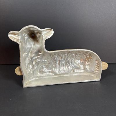 LOT 296: Vintage Unmarked Cast Aluminum Lamb/Sheep 2-Piece Candy Mold, Vintage Framed Needlepoint " Girl at the Window" &...