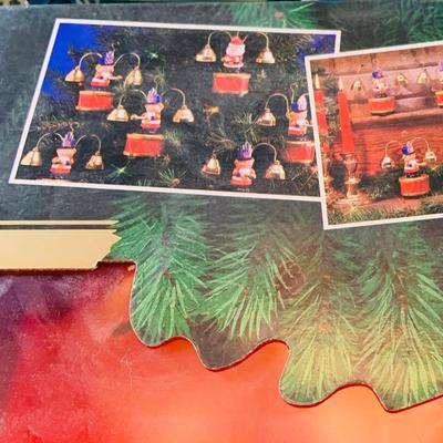 LOT 309: Mr Christmas' Santa's Marching Band with 16 Brass Bells and Plays 35 Christmas Carols in Working Condition with Box