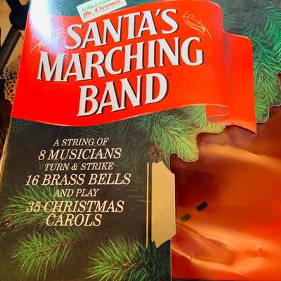 LOT 309: Mr Christmas' Santa's Marching Band with 16 Brass Bells and Plays 35 Christmas Carols in Working Condition with Box