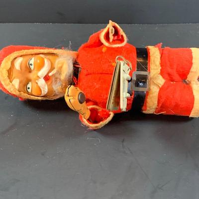 LOT 311: Vintage Mechanical Wind-up Toy Santas