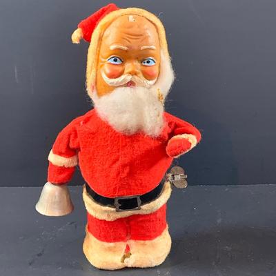 LOT 311: Vintage Mechanical Wind-up Toy Santas