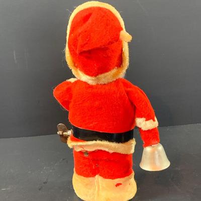 LOT 311: Vintage Mechanical Wind-up Toy Santas