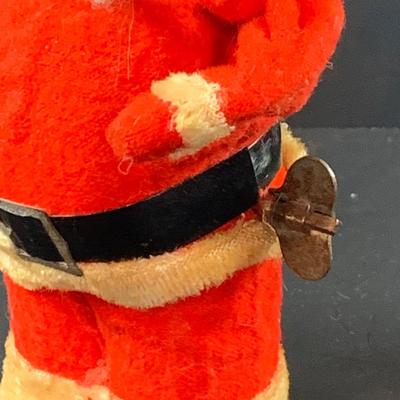 LOT 311: Vintage Mechanical Wind-up Toy Santas