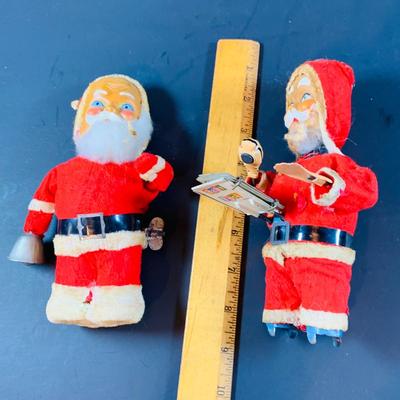LOT 311: Vintage Mechanical Wind-up Toy Santas