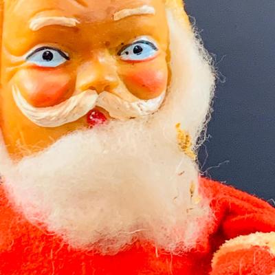 LOT 311: Vintage Mechanical Wind-up Toy Santas