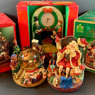 LOT 312: Collection of Holiday Home Decorations Including a Clock, Snow Globe and Fountian - All with Original Boxes