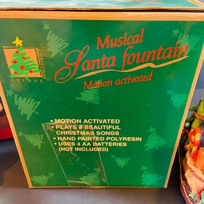 LOT 312: Collection of Holiday Home Decorations Including a Clock, Snow Globe and Fountian - All with Original Boxes