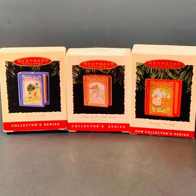 LOT 313: Disney Plushes Pinocchio and Goofy with Hallmark Ornaments- Pinocchio and Mother Goose and More