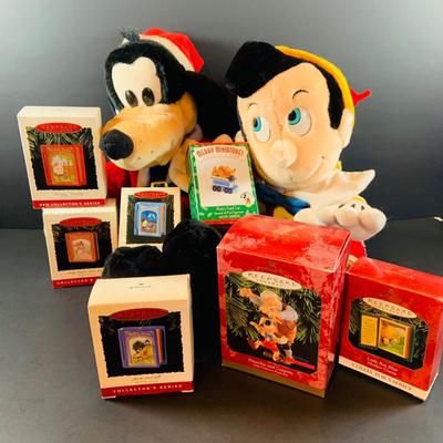 LOT 313: Disney Plushes Pinocchio and Goofy with Hallmark Ornaments- Pinocchio and Mother Goose and More