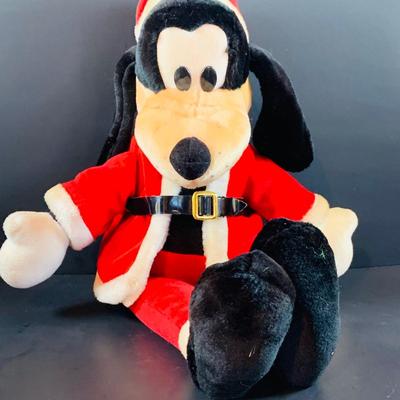 LOT 313: Disney Plushes Pinocchio and Goofy with Hallmark Ornaments- Pinocchio and Mother Goose and More