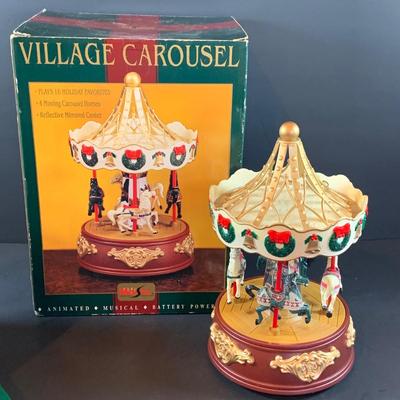 LOT314: Holiday Carousel Collection Including a Maisto Battery Powered Animated Musical Carousel, Hallmark Carousel Horse Ornaments and...