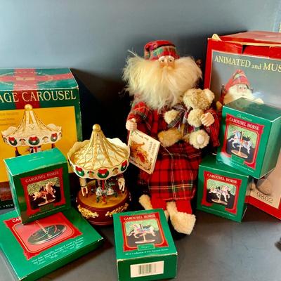 LOT314: Holiday Carousel Collection Including a Maisto Battery Powered Animated Musical Carousel, Hallmark Carousel Horse Ornaments and...