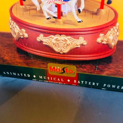 LOT314: Holiday Carousel Collection Including a Maisto Battery Powered Animated Musical Carousel, Hallmark Carousel Horse Ornaments and...