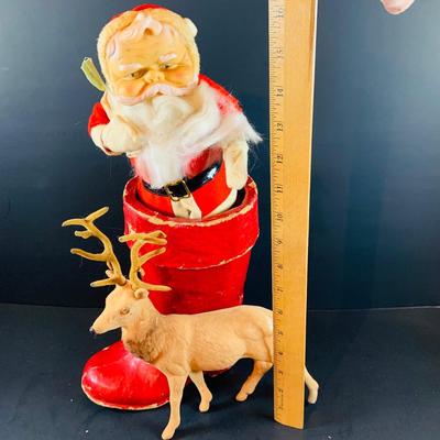 LOT 322: Vintage Santa Claus, Vintage Red Santa Boot Container and a Vintage Flocked Reindeer
