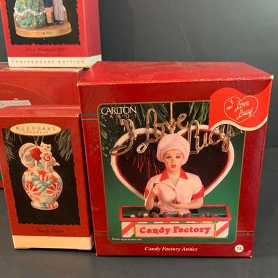 LOT 323: Large Assortment of Hallmark Christmas Ornaments Including I Love Lucy, Peanuts, It's a Wonderful Life and Many More