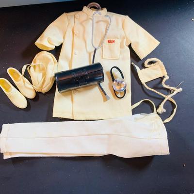 LOT 352: Barbie and Midge Doll Case with 1960's Barbie, Midge and Ken Doll and Ken Doll Uniform and Other Vintage Barbie Doll Cothes...