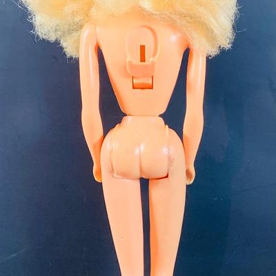 LOT 355: Vintage 1963 World of Barbie Doll Case with Dolls and Clothing.