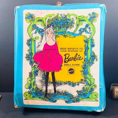LOT 355: Vintage 1963 World of Barbie Doll Case with Dolls and Clothing.