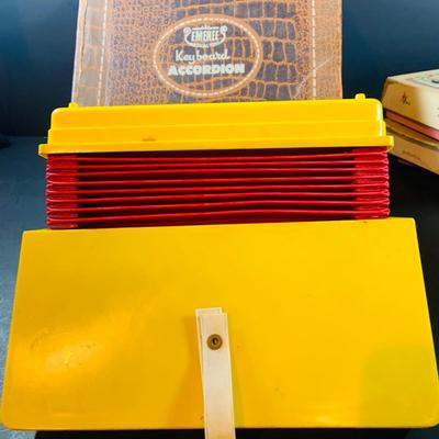 LOT 357: Vintage Childrens Toys, Games, and Books Including a Toy Piano and Ememee Toy Accordion