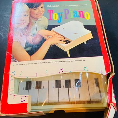 LOT 357: Vintage Childrens Toys, Games, and Books Including a Toy Piano and Ememee Toy Accordion