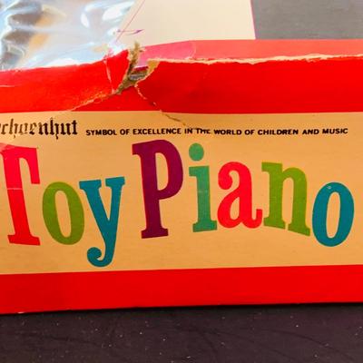 LOT 357: Vintage Childrens Toys, Games, and Books Including a Toy Piano and Ememee Toy Accordion