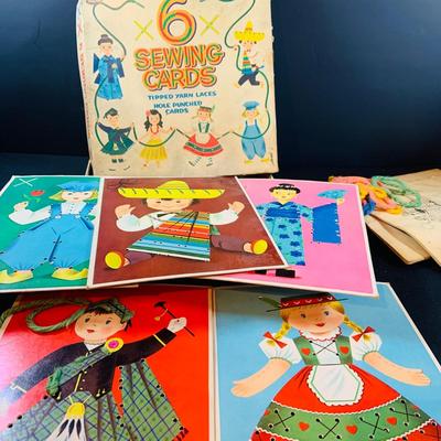 LOT 357: Vintage Childrens Toys, Games, and Books Including a Toy Piano and Ememee Toy Accordion