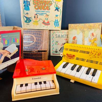 LOT 357: Vintage Childrens Toys, Games, and Books Including a Toy Piano and Ememee Toy Accordion