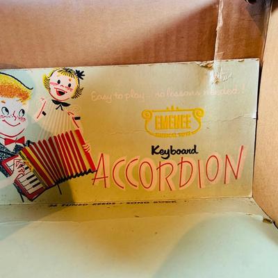 LOT 357: Vintage Childrens Toys, Games, and Books Including a Toy Piano and Ememee Toy Accordion