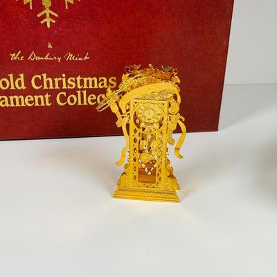 LOT 361: Danbury Mint Gold Christmas Ornaments - Some from the Collection, Others Dated