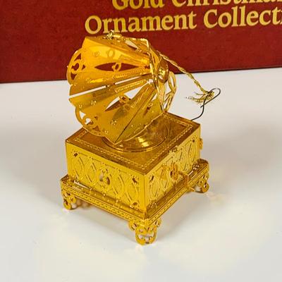 LOT 361: Danbury Mint Gold Christmas Ornaments - Some from the Collection, Others Dated