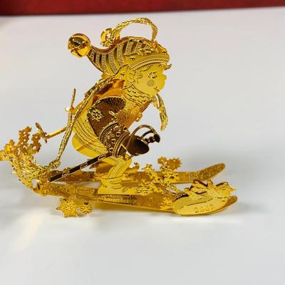 LOT 361: Danbury Mint Gold Christmas Ornaments - Some from the Collection, Others Dated