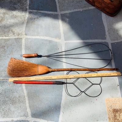 LOT 364: Collection of Primitive Baskets, Arts & Crafts Country Rush Footstool, Primitive Broom and Rug Beaters