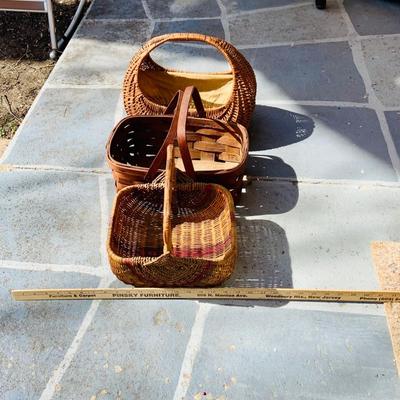 LOT 364: Collection of Primitive Baskets, Arts & Crafts Country Rush Footstool, Primitive Broom and Rug Beaters
