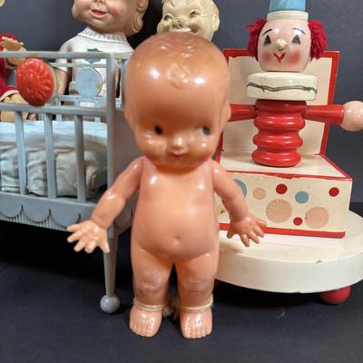 LOT 406: Vintage Doll Collection: Irwin Kewpie Doll, Plastic Doll w/Sleepy Eyes, Blue Doll Crib, Rubber Salvation Army Doll, Squeaky...