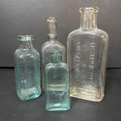 LOT 412: Vintage/Antique Bottles: McCormick, Hoods Sarsaparilla, Hires Household & More