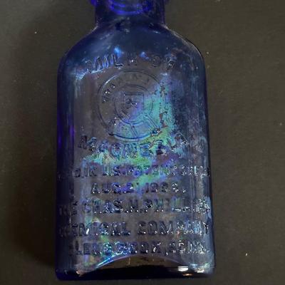 LOT 412: Vintage/Antique Bottles: McCormick, Hoods Sarsaparilla, Hires Household & More