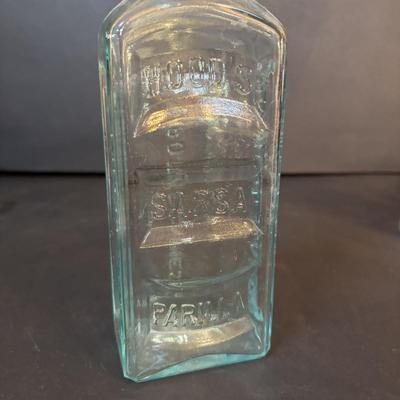 LOT 412: Vintage/Antique Bottles: McCormick, Hoods Sarsaparilla, Hires Household & More