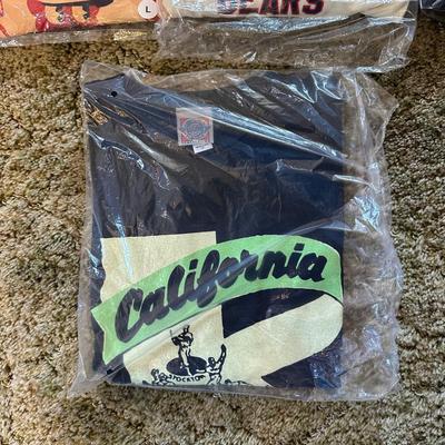 LOT 33Y: New In Package Sports Themed T Shirts