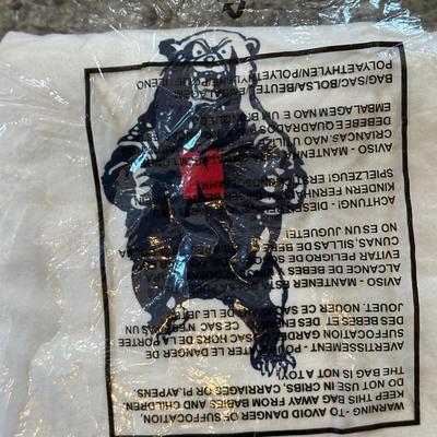 LOT 33Y: New In Package Sports Themed T Shirts