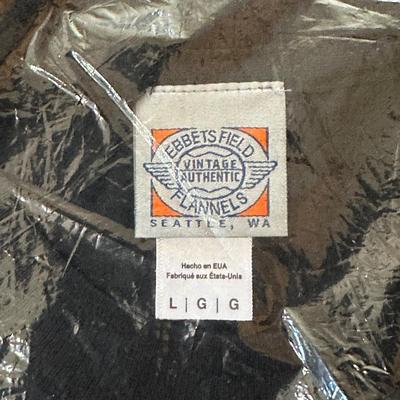 LOT 33Y: New In Package Sports Themed T Shirts