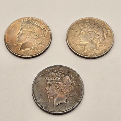 LOT 105J: Three 1923 Silver Peace Dollars / No Mint Mark Philadelphia