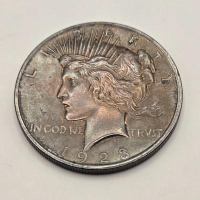 LOT 105J: Three 1923 Silver Peace Dollars / No Mint Mark Philadelphia