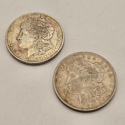 LOT 106J: Two 1921 Morgan Silver Dollars/ No Mint Mark Philadelphia