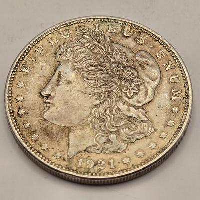 LOT 106J: Two 1921 Morgan Silver Dollars/ No Mint Mark Philadelphia
