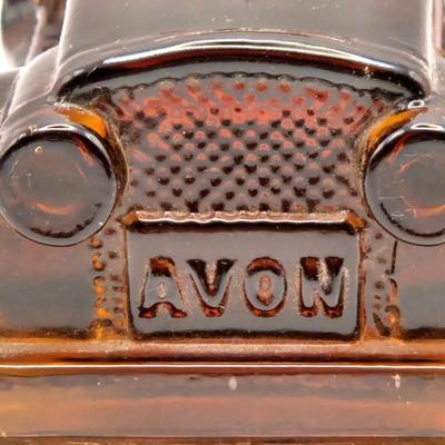 LOT 114K: Two Piggy Banks, Avon Cologne Decanters, & Small Replica of English Field Gun