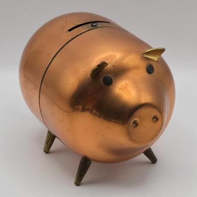 LOT 114K: Two Piggy Banks, Avon Cologne Decanters, & Small Replica of English Field Gun