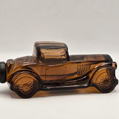 LOT 114K: Two Piggy Banks, Avon Cologne Decanters, & Small Replica of English Field Gun